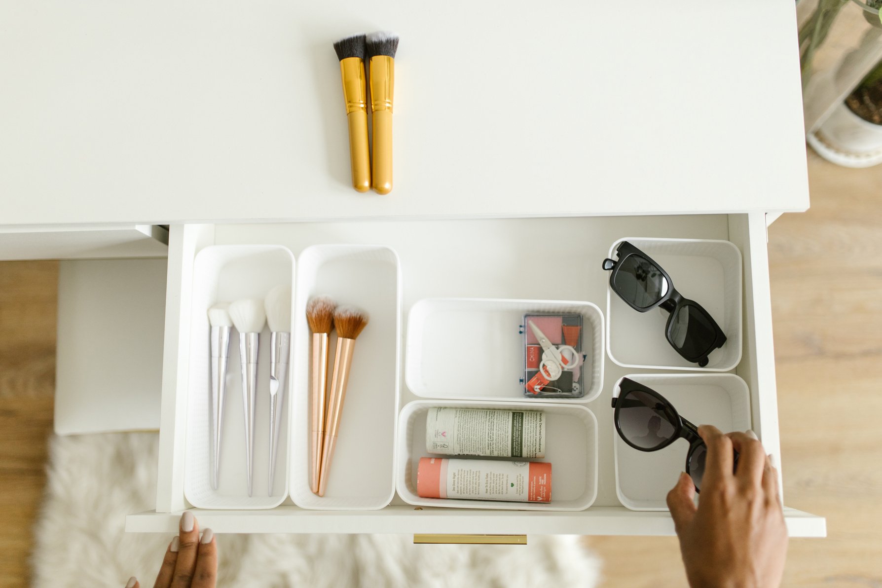 A Person Organizing the Drawer